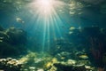 Underwater view of a coral reef with fishes and sunbeams Royalty Free Stock Photo