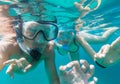Underwater view of snorkeling couple in the sea Royalty Free Stock Photo