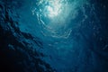 underwater view of dark blue ocean water, under the surface Royalty Free Stock Photo