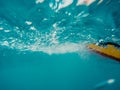 Underwater view of a moving inflatable ring that floating in the water Royalty Free Stock Photo