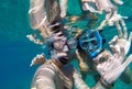 Underwater view of a snorkeling couple