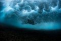 Underwater view of the surfer