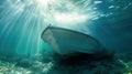 Underwater View of a White Boat Hull with Sunlight Rays Royalty Free Stock Photo