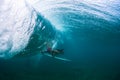 Underwater view of the young male surfer