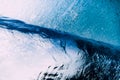 Underwater wave in ocean and sun rays. Water texture in blue sea Royalty Free Stock Photo