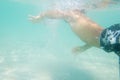 Underwater young boy diving Royalty Free Stock Photo