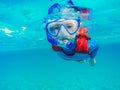 Underwater Young Boy Fun in the sea with snorkel. Summer Vacation Fun.