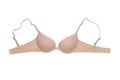 Underwear woman isolated. Close-up of beige or flesh-colored bra isolated on a white background. Useful for wearing under bright Royalty Free Stock Photo