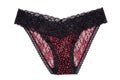 Underwear woman isolated. Close-up of a luxurious elegant black red lacy thongs panties isolated on a white background. Underwear Royalty Free Stock Photo