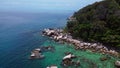 Undiscovered beach palm trees rocks. Unbelievable aerial top view flight drone