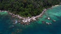 Undiscovered beach palm trees smooth rocks. Marvelous aerial view flight drone