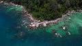 Undiscovered beach palm trees smooth rocks. Spectacular aerial view flight drone