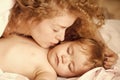 Undisturbed sleep of the child. Mother with baby Royalty Free Stock Photo