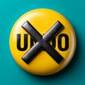 Undo button with black X on yellow circle, teal background Royalty Free Stock Photo