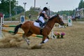 Undory, Ulyanovsk Region, Russia - September 2, 2018: Girl rider riding a horse performs at equestrian competitions