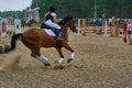 Undory, Ulyanovsk Region, Russia - September 2, 2018: Girl rider riding a horse performs at equestrian competitions