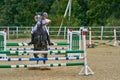 Undory, Ulyanovsk Region, Russia - September 2, 2018: Girl rider riding a horse performs at equestrian competitions