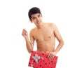 Undressed young man holding present Royalty Free Stock Photo