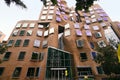 Wavy brick facade of Dr Chau Chak Wing Building with array of rectangular windows at University Technology Sydney UTS, Australia Royalty Free Stock Photo