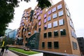 Wavy brick facade of Dr Chau Chak Wing Building with array of rectangular windows at University Technology Sydney UTS, Australia Royalty Free Stock Photo