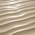 Undulating beige sand dunes with smooth, rhythmic patterns create a striking visual. The surface\'s Royalty Free Stock Photo