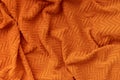 Undulating orange plush bath towel fabric