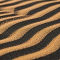 Undulating patterns of sand with alternating light and shadow Royalty Free Stock Photo