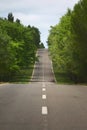 Undulating road on a hillside in a wooded area of San Luis, Argentina.