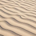 Undulating sand dunes with smooth parallel ridges create a natural pattern Royalty Free Stock Photo