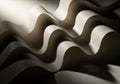 Undulating waves of folded paper create a sculptural landscape of light and shadow. Royalty Free Stock Photo