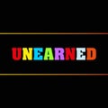 unearned word block on black Royalty Free Stock Photo