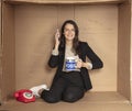 Unemployed business woman is looking for a job by phone Royalty Free Stock Photo