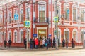 unemployed people stand at the entrance to the labor exchange, to look for work. Text in Russian: employment center of the popula