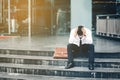 Unemployed Tired or stressed businessman sitting on the walkway Royalty Free Stock Photo