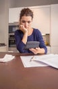 Unemployed woman with debts review monthly bills Royalty Free Stock Photo