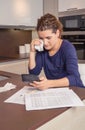 Unemployed woman with debts review monthly bills Royalty Free Stock Photo