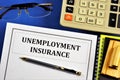 Unemployment insurance-compensation, the payment of benefits provided to employees who have lost their jobs through no fault of