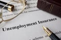 Unemployment insurance written on a paper. Royalty Free Stock Photo