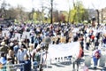 Unemployment strike, protest or anti government public demonstration, blurred protesting crowd in the background Royalty Free Stock Photo