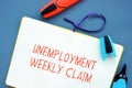 Unemployment Weekly Claim sign on the piece of paper