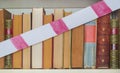 Unequal educational opportunities, books and barrier tape, symbol