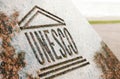 UNESCO world heritage sign carved on stone Royalty Free Stock Photo