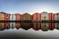 Unesco world heritage site of old ancient wooden buildings by the river of Nidelva in Trondheim. Royalty Free Stock Photo