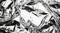 An uneven metallic effect composed of shiny silvergray crumpled foil Royalty Free Stock Photo