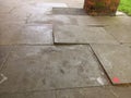 Uneven paving slabs in shopping centre causing trip hazard