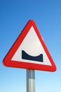 Uneven road sign Royalty Free Stock Photo