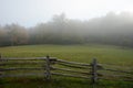 Uneven Split Rail Fence in Fog Royalty Free Stock Photo