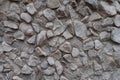 Uneven surface of gray gravel pebble dash on the wall Royalty Free Stock Photo