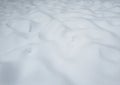 Uneven white snow surface on the ground Royalty Free Stock Photo
