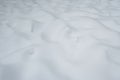 Uneven white snow surface on the ground Royalty Free Stock Photo
